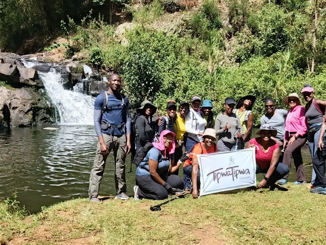 TipwaTipwa members gathered with the club banner at a river crossing